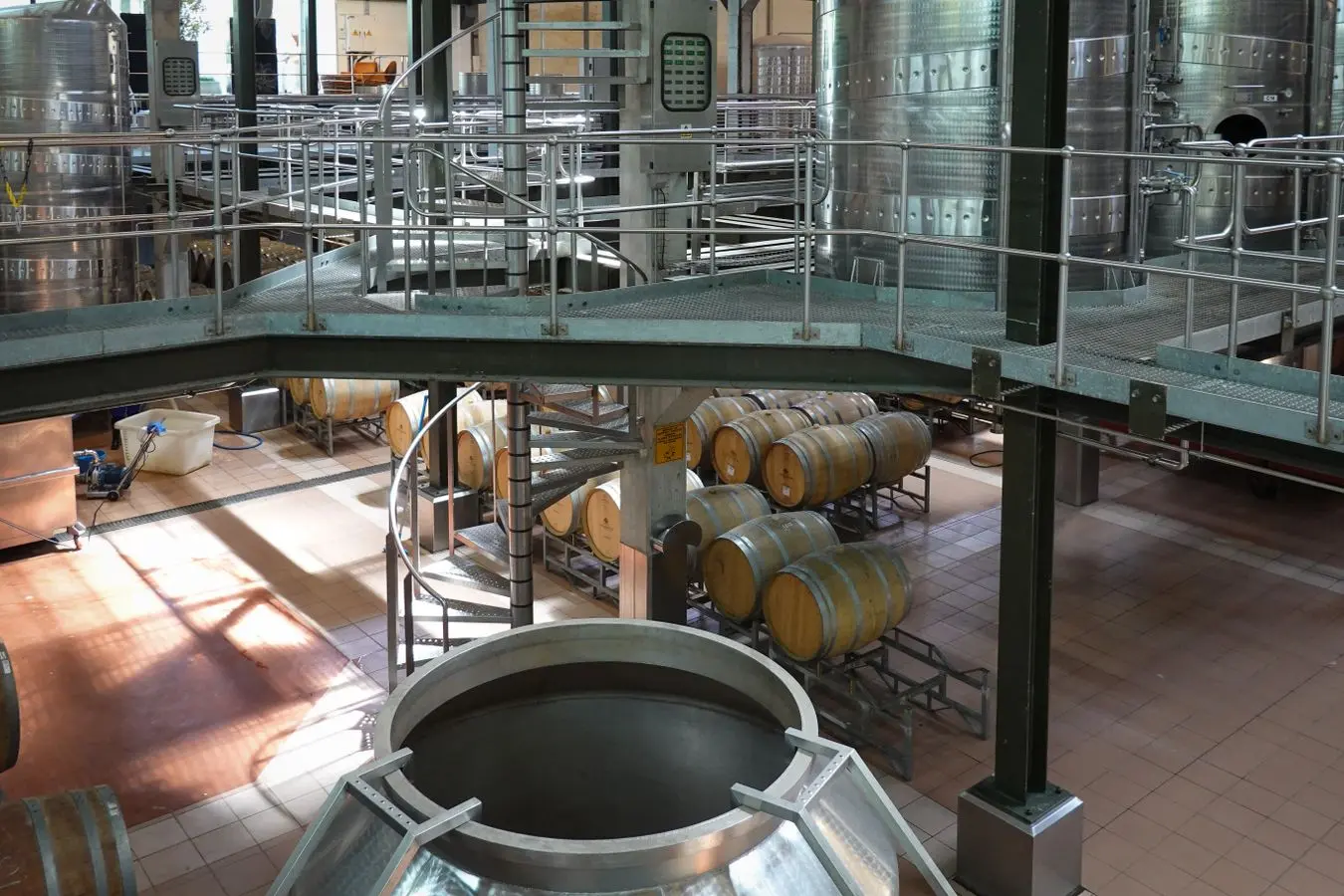 Winery fermentation tanks representing simultaneous cooling and heat demand